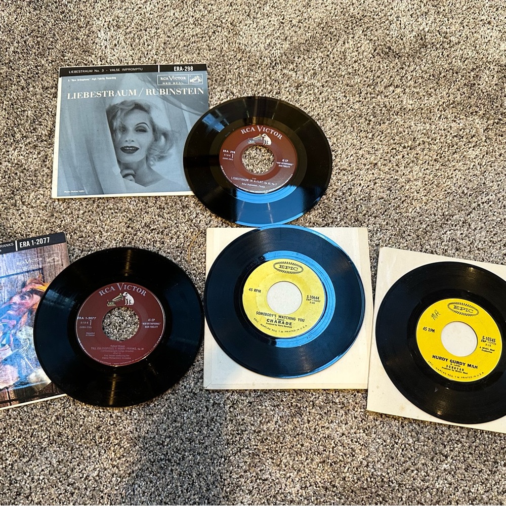 Four 45 RPM records- old!